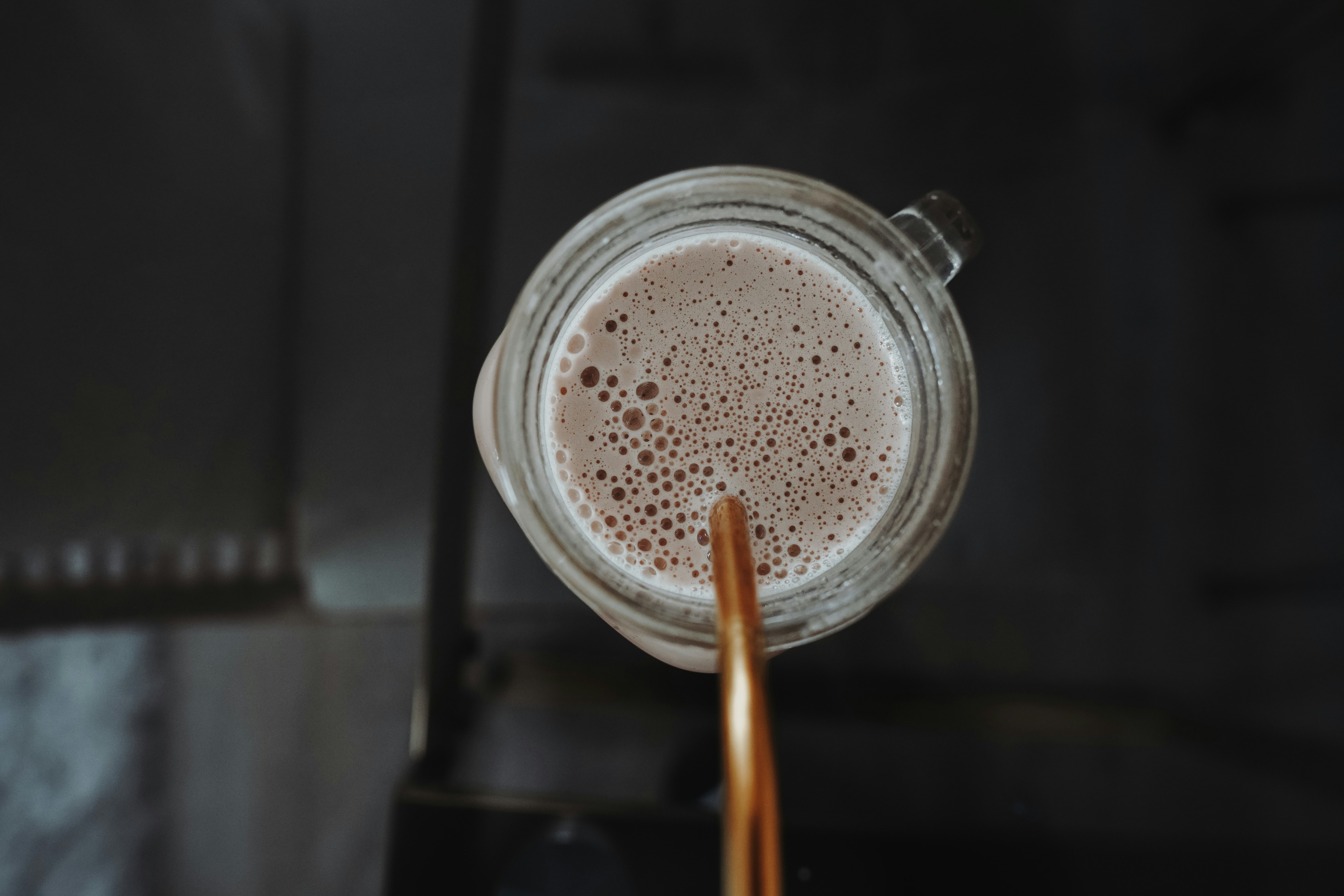 clear glass jar with brown liquid